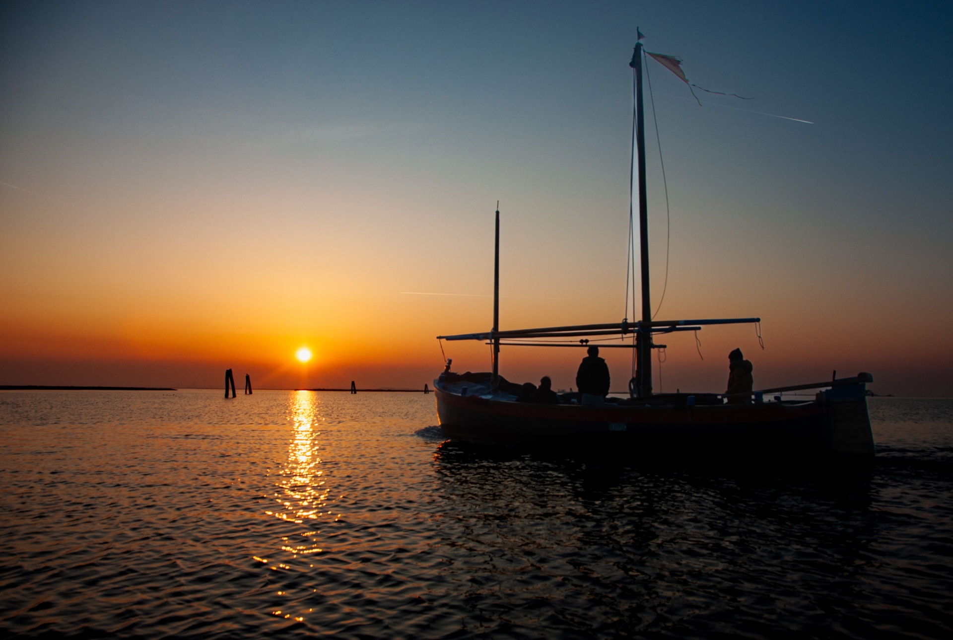 Golden light over the Venice lagoon from a private Bragosso